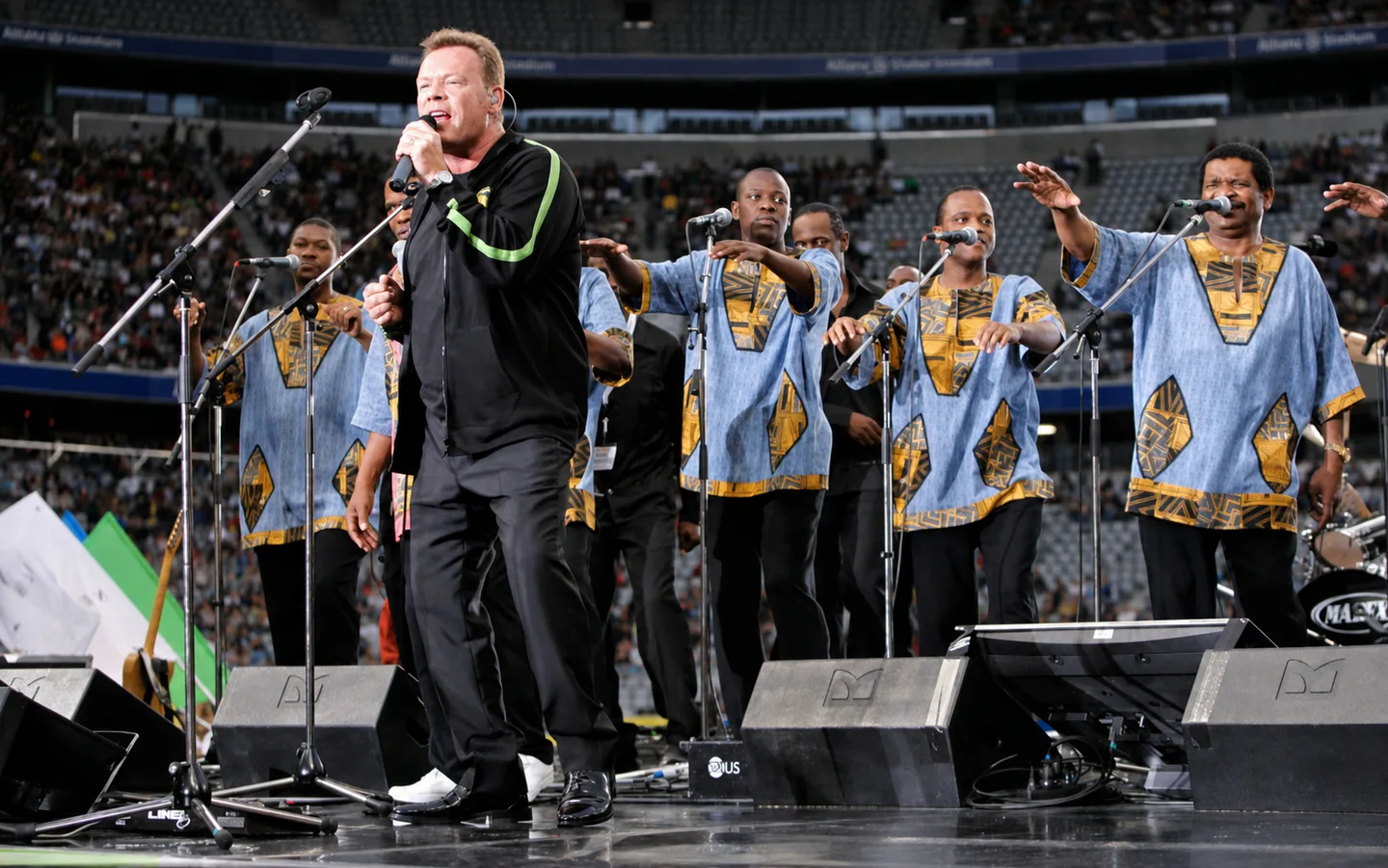 Singers performing on stage during the Goal4Africa event at the Allianz Arena.